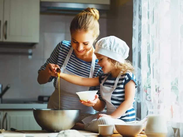 interim foster carer and child baking